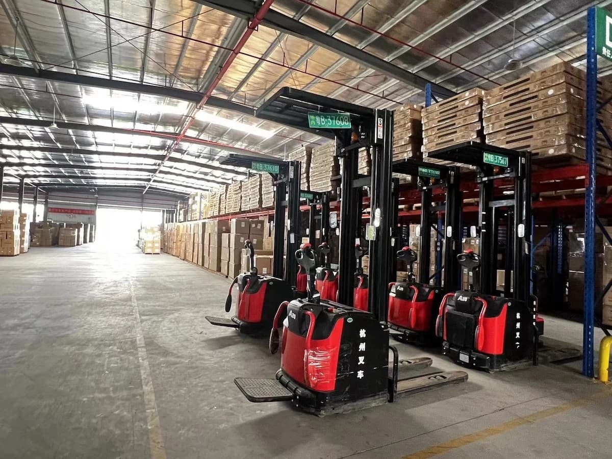 Electric pallet jacks inside cargo warehouse operations
